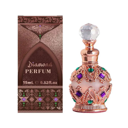 Exotic Arabian perfume bottle by Silcy Skin in pink rose with jeweled crown beside Diamond box on Tampa Home & Garden Store