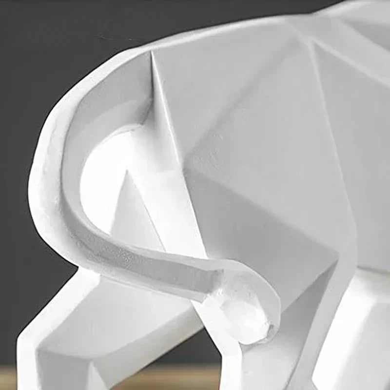 Perfecsy white resin bull figurine in Nordic geometric design for decor on Tampa Home & Garden Store