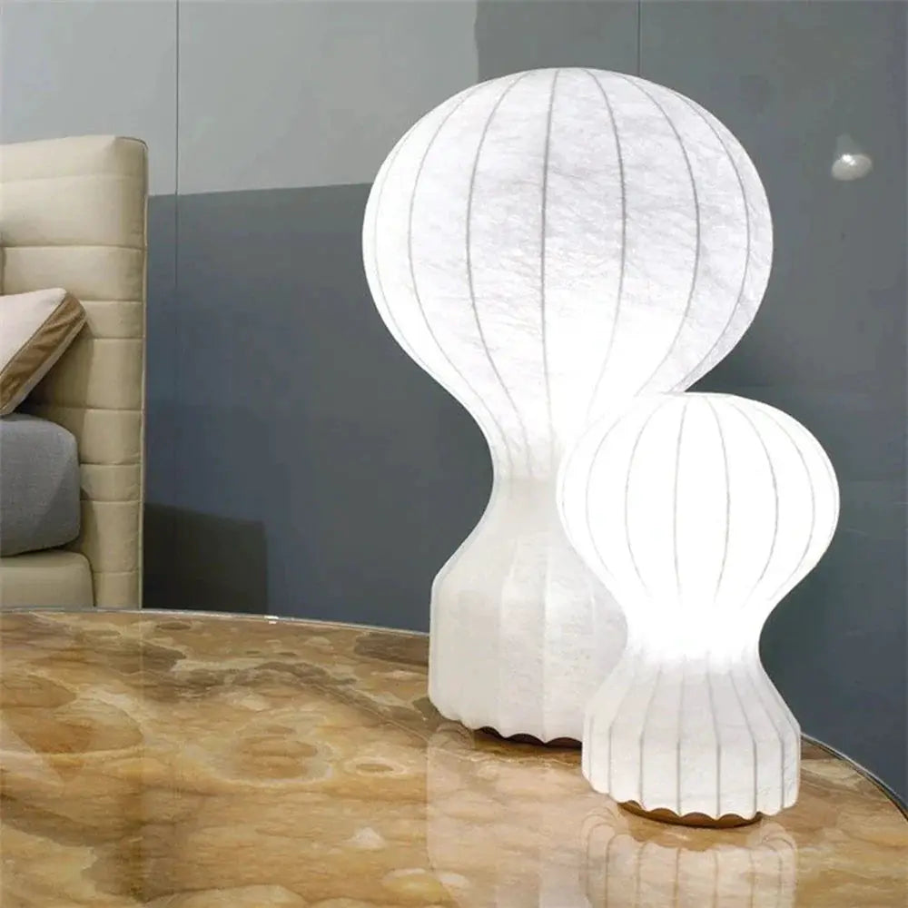 DecorBites LED fabric floor lamp with double white globe shades on marble table on Tampa Home & Garden Store