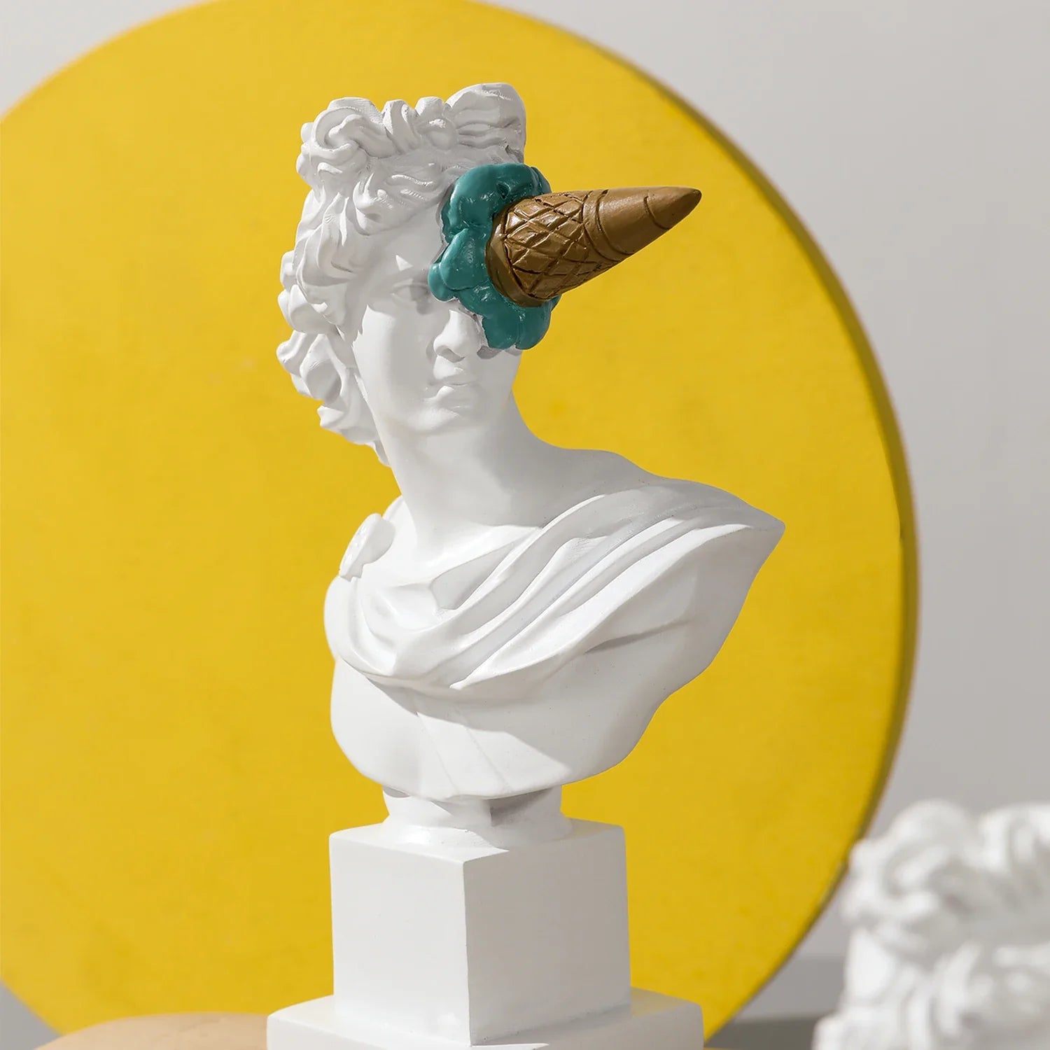 Apollo sculpture bust resin decor, white with brown ice-cream cone and teal cloud accent on Tampa Home & Garden Store