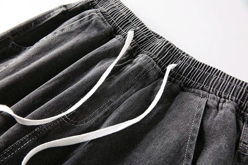Men's wide-leg jeans in black denim with white drawstring and elastic waistband UpTrend Deals on Tampa Home & Garden Store