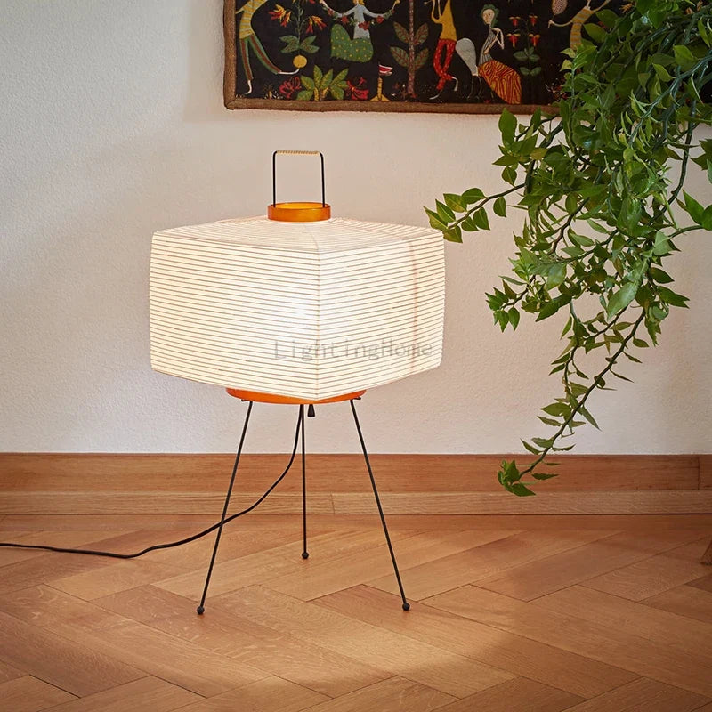 Perfecsy Japanese tripod floor lamp with rice paper shade, black legs and orange accents on Tampa Home & Garden Store