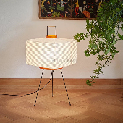 Perfecsy Japanese tripod floor lamp with rice paper shade, black legs and orange accents on Tampa Home & Garden Store