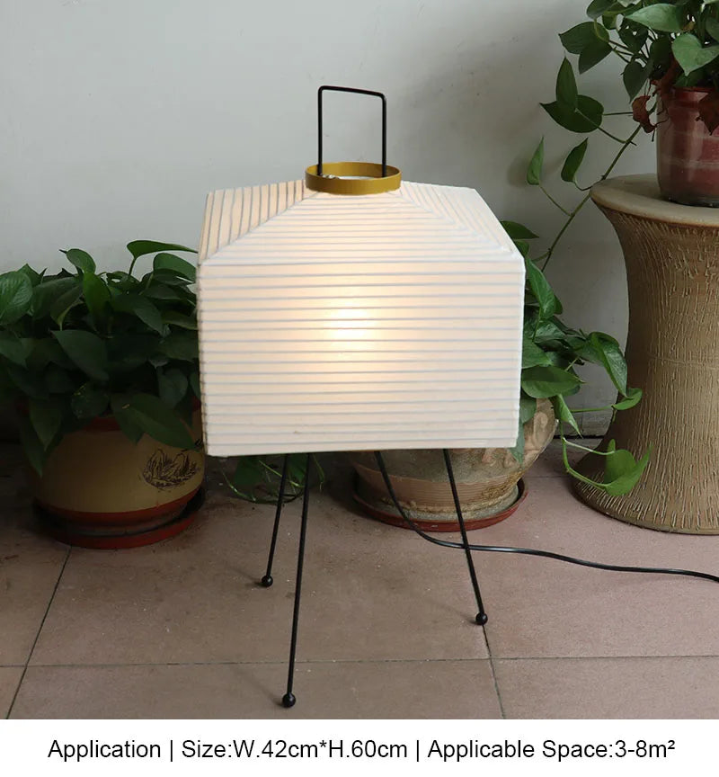 Japanese rice paper tripod floor lamp with square pleated shade on black metal legs on Tampa Home & Garden Store
