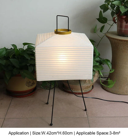 Japanese rice paper tripod floor lamp with square pleated shade on black metal legs on Tampa Home & Garden Store