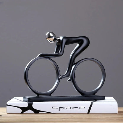 Perfecsy modern abstract resin bicycle rider statue, black with silver head on a base on Tampa Home & Garden Store