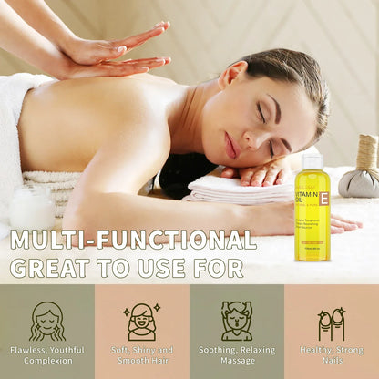 MAYJAM Vitamin E Oil bottle with yellow liquid on spa table during relaxing massage on Tampa Home & Garden Store