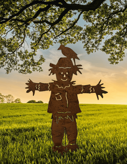 Outdoor scarecrow garden statue silhouette rust-colored metal with crow on hat on Tampa Home & Garden Store