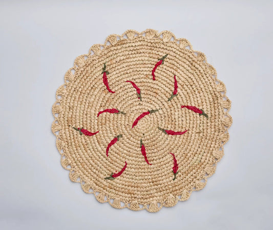 Handwoven raffia round placemat with scattered red chili embroidery, natural beige Payton James on Tampa Home & Garden Store