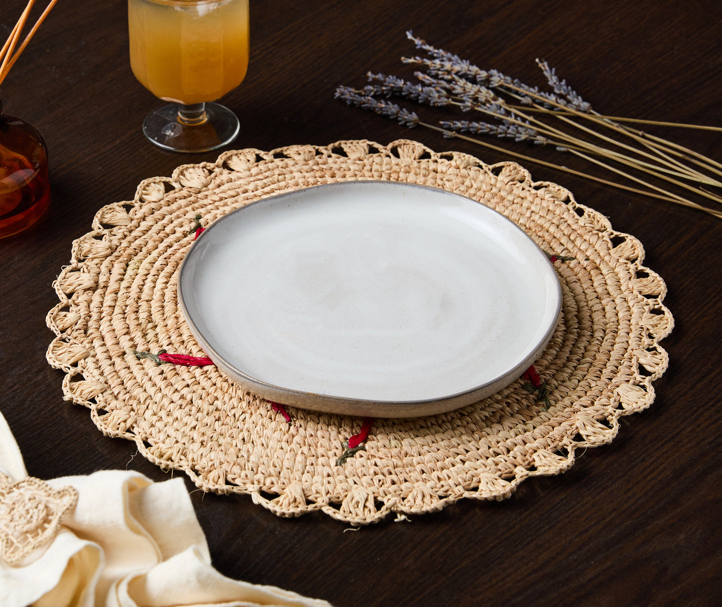 Scattered Chili Handwoven Raffia Round Placemat – Artisan Table Décor - Tampa Home & Garden Store