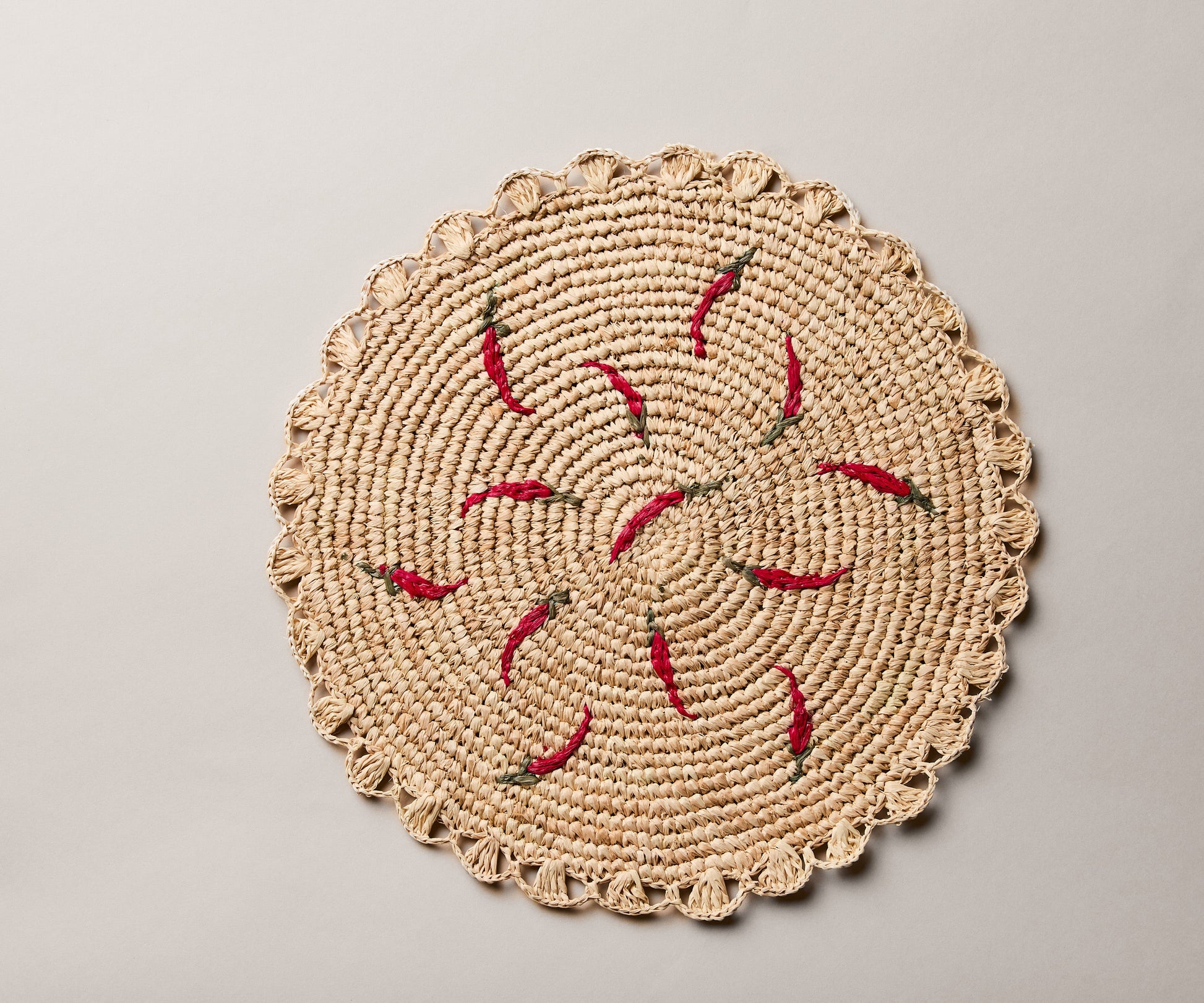 Scattered Chili Handwoven Raffia Round Placemat – Artisan Table Décor - Tampa Home & Garden Store