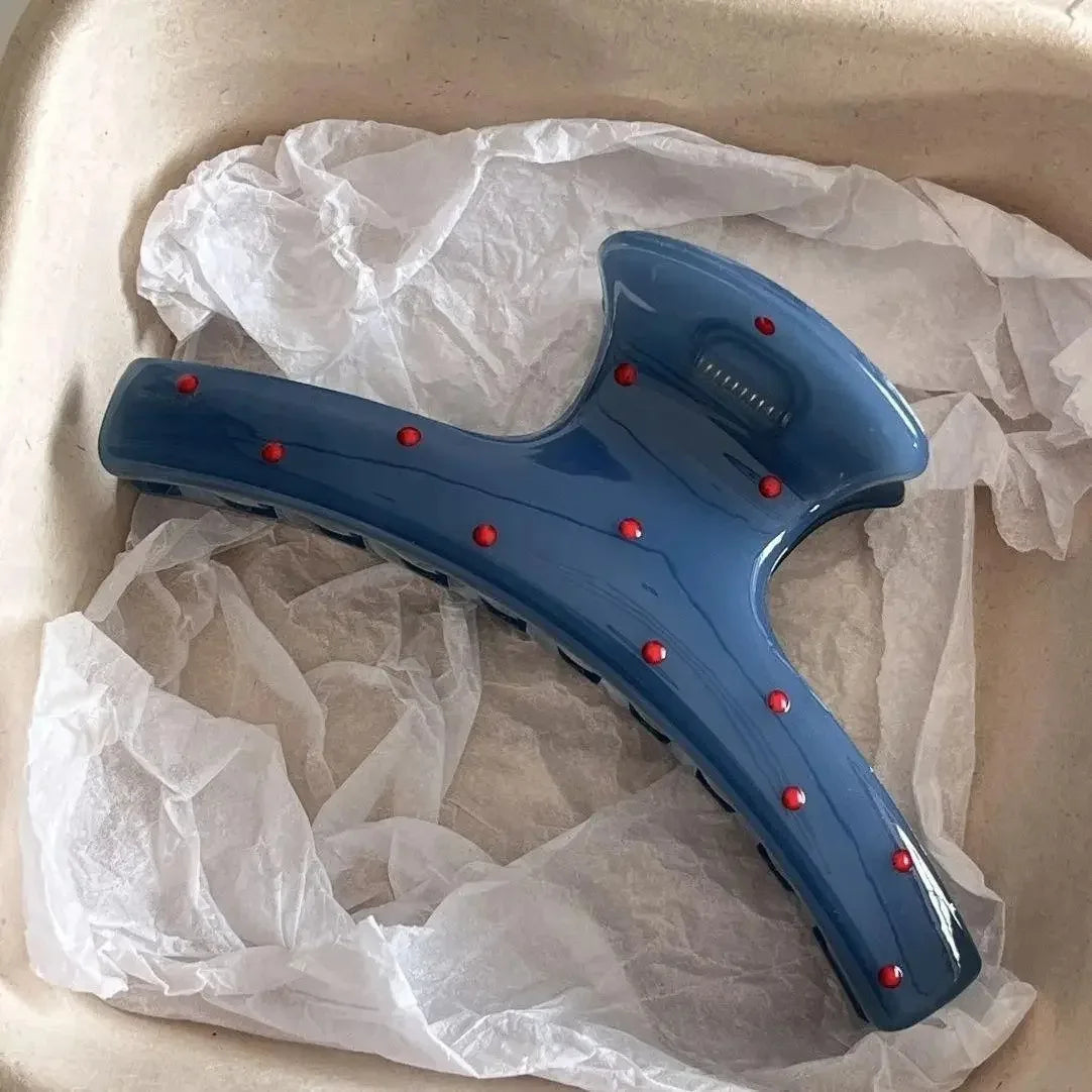 Blue shark-claw hair clip with red studs, glossy plastic, Silcy Skin on Tampa Home & Garden Store