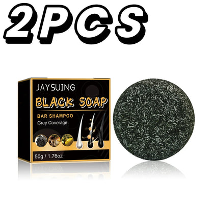 Herbal dandruff shampoo bar black box beside charcoal soap disk on Tampa Home & Garden Store
