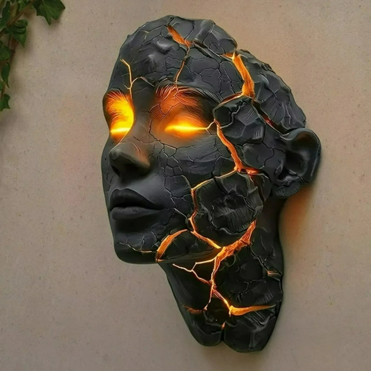 Cracked Soul wall lamp sculpture in dark resin with glowing orange lava veins Perfecsy on Tampa Home & Garden Store