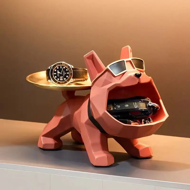 Pink resin bulldog statue with back tray for keys and jewelry; watch on display on Tampa Home & Garden Store
