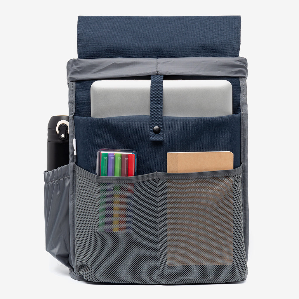 Kaut Backpack Navy with 19L Laptop Pocket, front mesh pocket and laptop sleeve on Tampa Home & Garden Store