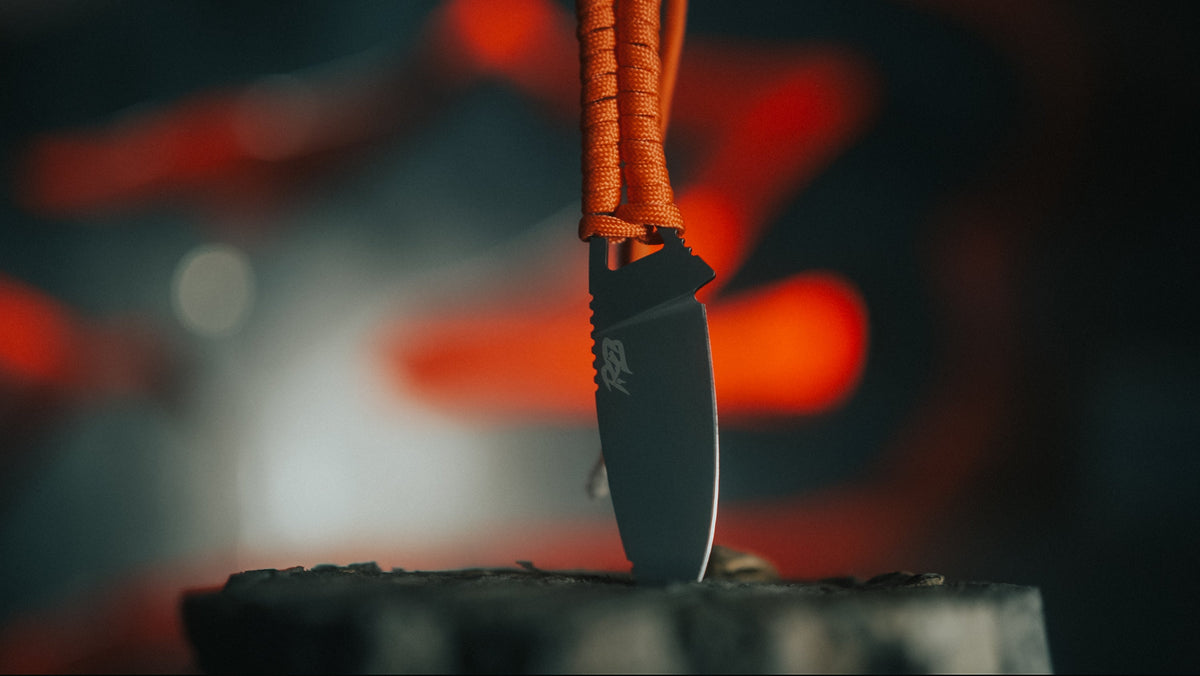 Ultralight Ridge Blade knife by Ridge Belts with black blade and orange paracord wrap on Tampa Home & Garden Store