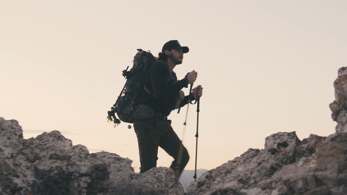 MTN LITE Buckle Ridge Belts for hikers; rugged hiker with camo backpack and hiking poles on Tampa Home & Garden Store