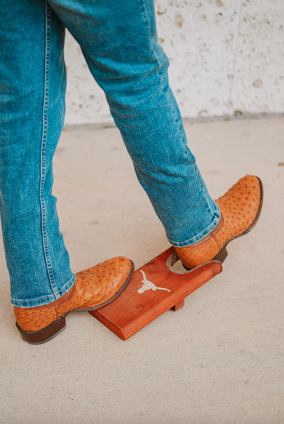 Texas Longhorn Boot Jack wooden orange block with white longhorn logo for boot pulls on Tampa Home & Garden Store