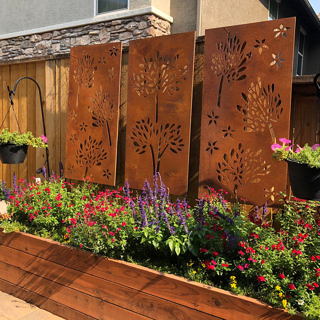 Outdoor privacy screen set by Rustica Ornamentals: 4 rust metal panels with tree cutouts on Tampa Home & Garden Store
