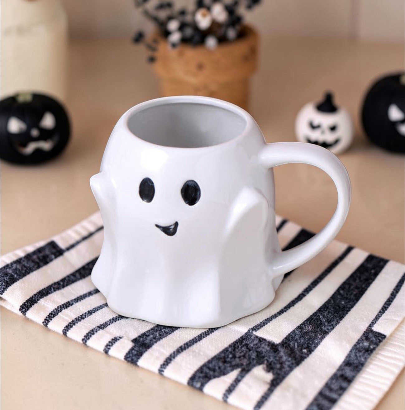 Gia Roma Ghost Mug, white ceramic coffee mug with a friendly ghost face on Tampa Home & Garden Store