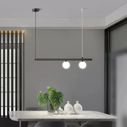 DecorBites black metal linear minimalist chandelier pendant light with dual globe bulbs on Tampa Home & Garden Store