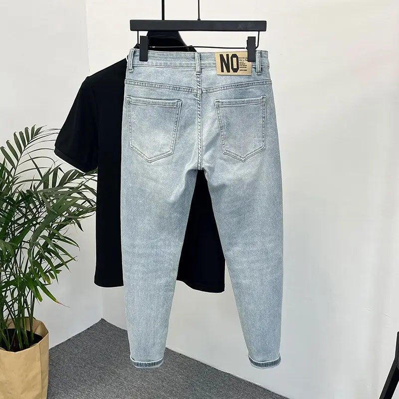 Men's skinny jeans in light wash denim, slim fit with back pockets on Tampa Home & Garden Store