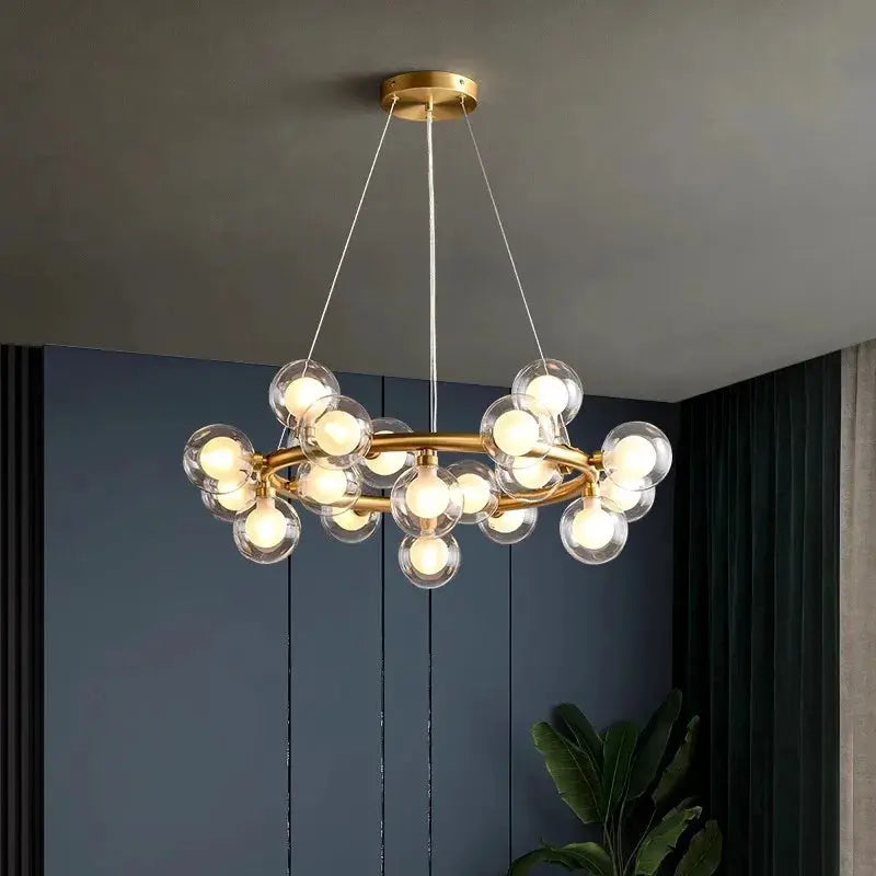 DecorBites LED pendant chandelier with gold brass ring and clear glass globes for dining on Tampa Home & Garden Store