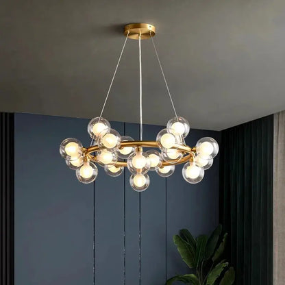 DecorBites LED pendant chandelier with gold brass ring and clear glass globes for dining on Tampa Home & Garden Store