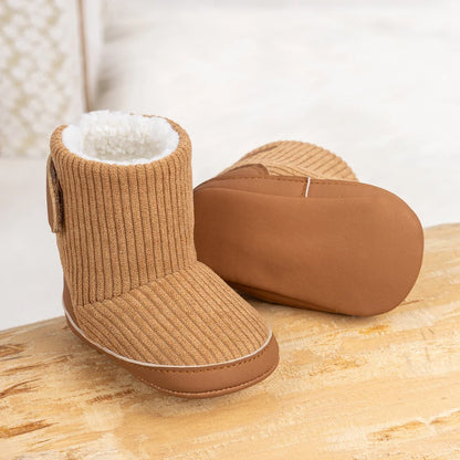 Newborn winter boots pair, tan corduroy booties with white fleece lining and rubber sole on Tampa Home & Garden Store