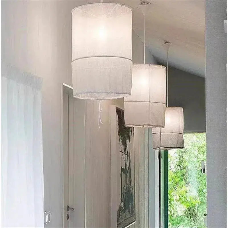 DecorBites Linen Cloth Pendant Lights with white linen shades, four boho chandeliers on Tampa Home & Garden Store