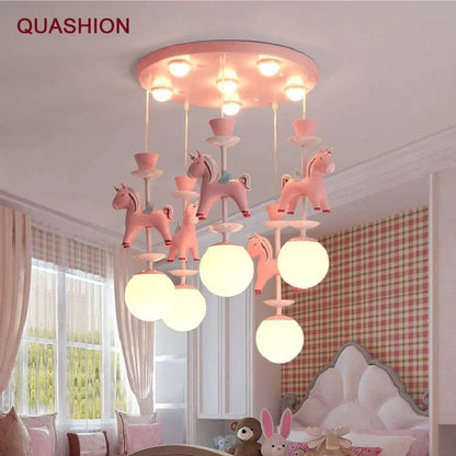 DecorBites Carousel Chandelier pink pendant light with unicorn charms and bulbs on Tampa Home & Garden Store
