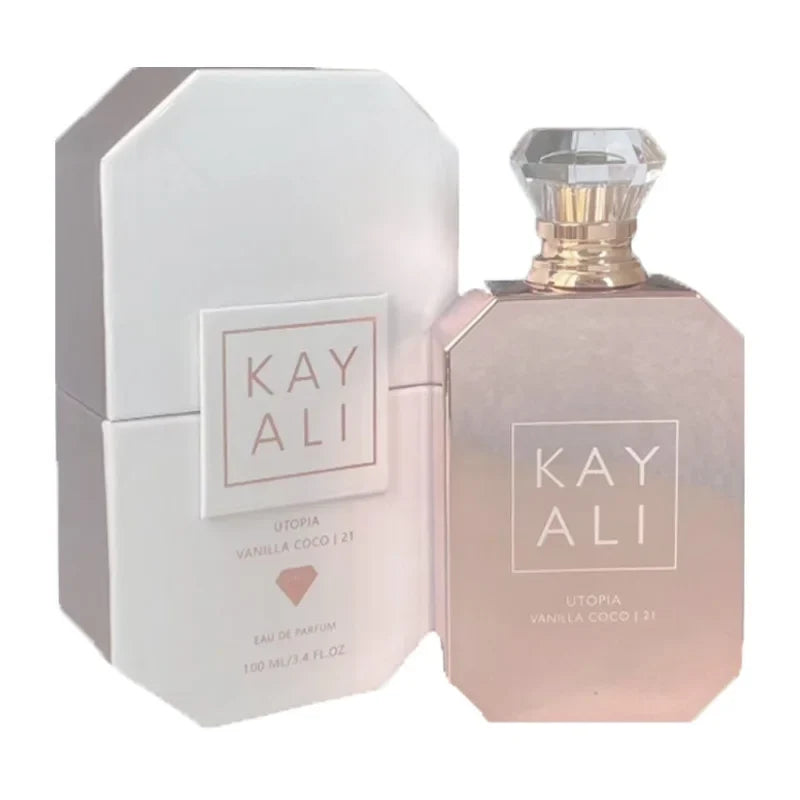 Kayali EDP Intense perfume bottle with pink glass and faceted cap beside a silver box on Tampa Home & Garden Store