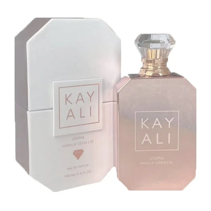 Kayali EDP Intense perfume bottle with pink glass and faceted cap beside a silver box on Tampa Home & Garden Store