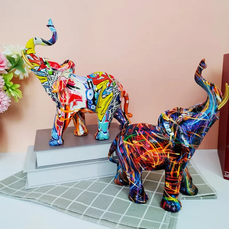 Two colorful graffiti elephant sculptures in resin decor by Perfecsy for home decor on Tampa Home & Garden Store