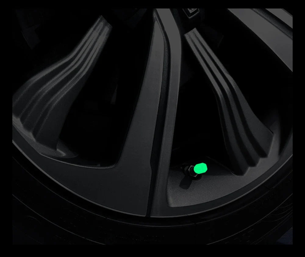 4pcs luminous valve stem caps with green glow on black wheel rim by BikerZoneZ on Tampa Home & Garden Store