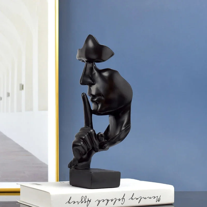 Perfecsy black resin thinker statue with finger to lips, abstract home decor on Tampa Home & Garden Store