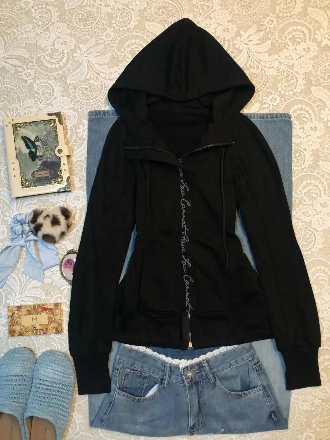 Harajuku Hooded Zip-Up Hoodie black with vertical script along zipper paired with denim shorts on Tampa Home & Garden Store