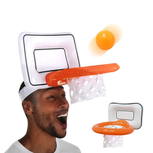Two mini inflatable basketball hoops with white backboards, orange rims and clear nets; orange ball in motion, worn on head by man on Tampa Home & Garden Store