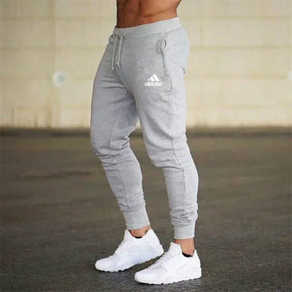 Grey men's joggers with drawstring waist and cuffed ankles, Adidas logo, UpTrend Deals on Tampa Home & Garden Store