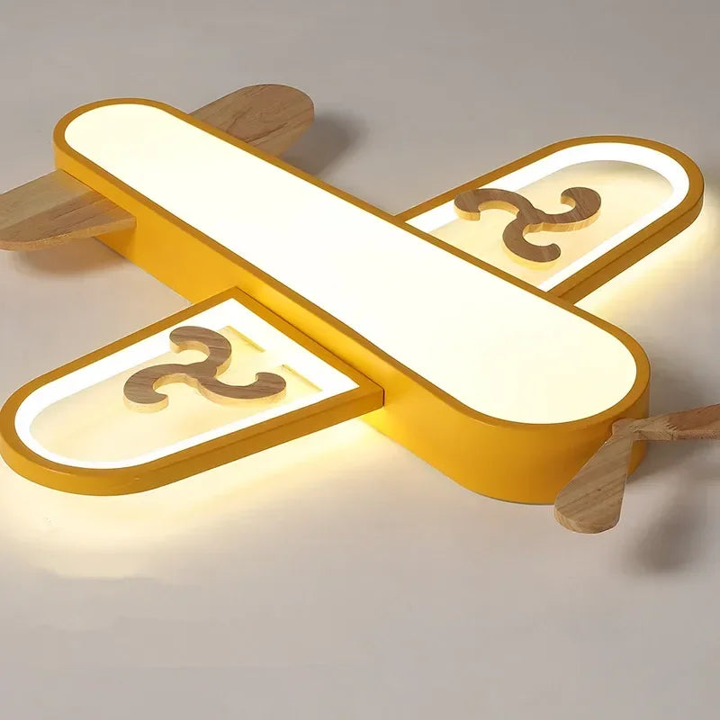 DecorBites Kids LED Wood Ceiling Light, yellow airplane design with wood propellers on Tampa Home & Garden Store