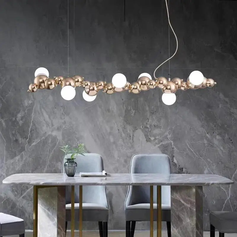 DecorBites LED pendant chandelier with gold-tone bead spheres and white globes on Tampa Home & Garden Store