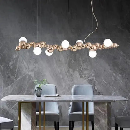 DecorBites LED pendant chandelier with gold-tone bead spheres and white globes on Tampa Home & Garden Store