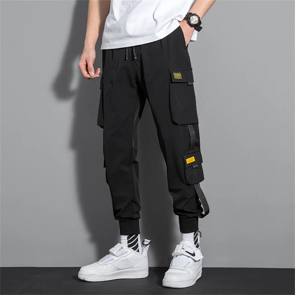 Men's black cargo joggers with multiple pockets and tapered cuffs on Tampa Home & Garden Store