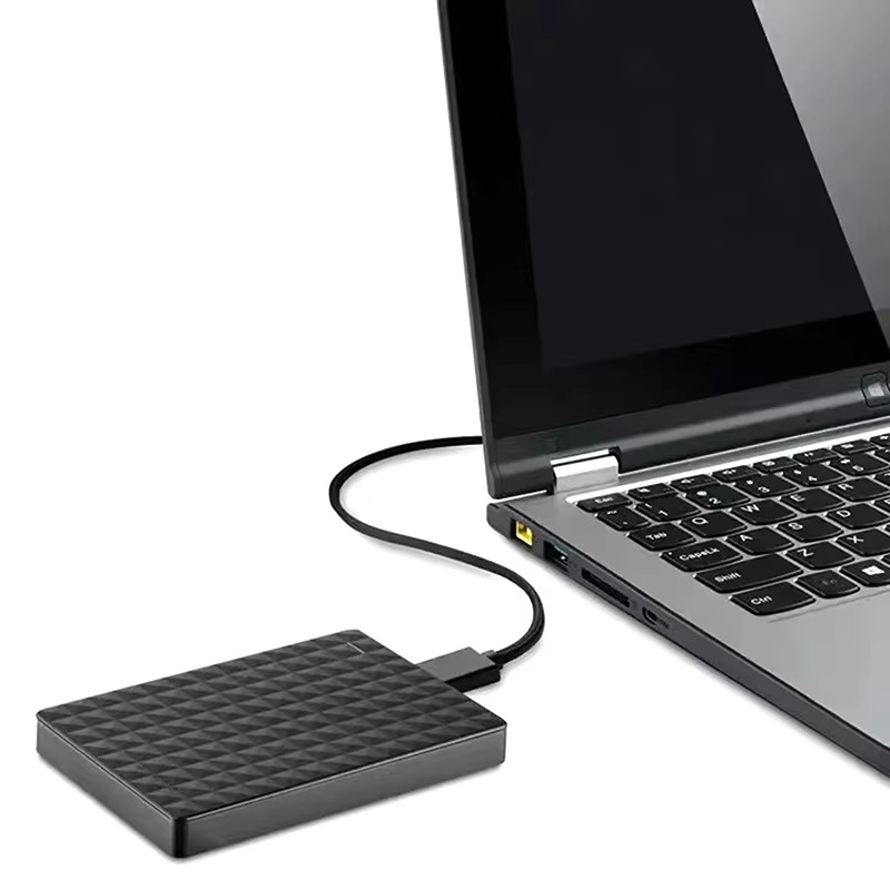 64GB Moktan Sabai portable external hard drive with black top plugged into laptop on Tampa Home & Garden Store