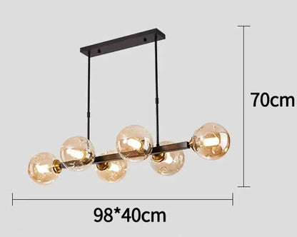 DecorBites LED pendant chandelier with five glass globe bulbs on dark metal bar mount glow on Tampa Home & Garden Store