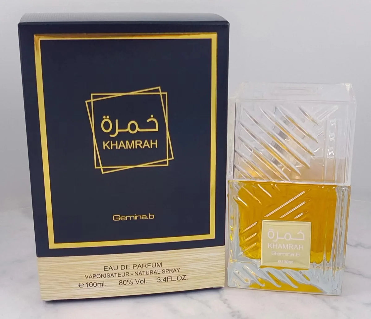 Khamrah unisex perfume gift box with navy gold design, 100ml amber bottle Gemina.b branding on Tampa Home & Garden Store