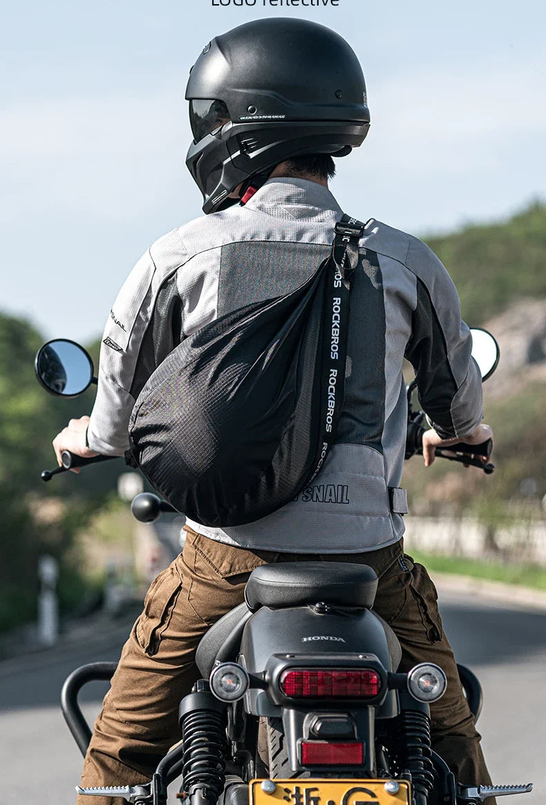 Motorcycle helmet backpack, black large-capacity reflective bag with ROCKERBOS strap worn by rider on Tampa Home & Garden Store