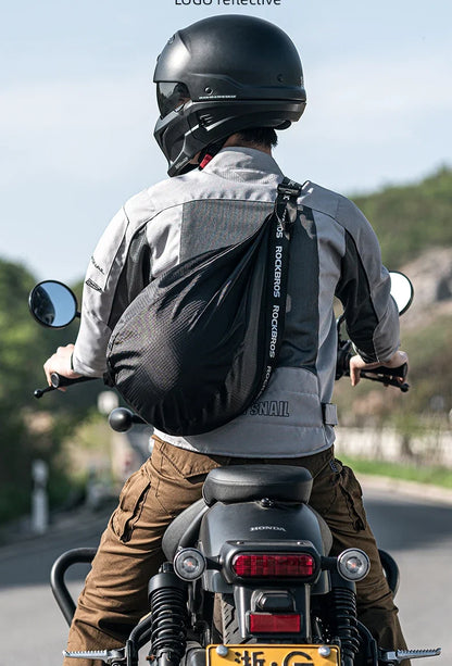 Motorcycle helmet backpack, black large-capacity reflective bag with ROCKERBOS strap worn by rider on Tampa Home & Garden Store