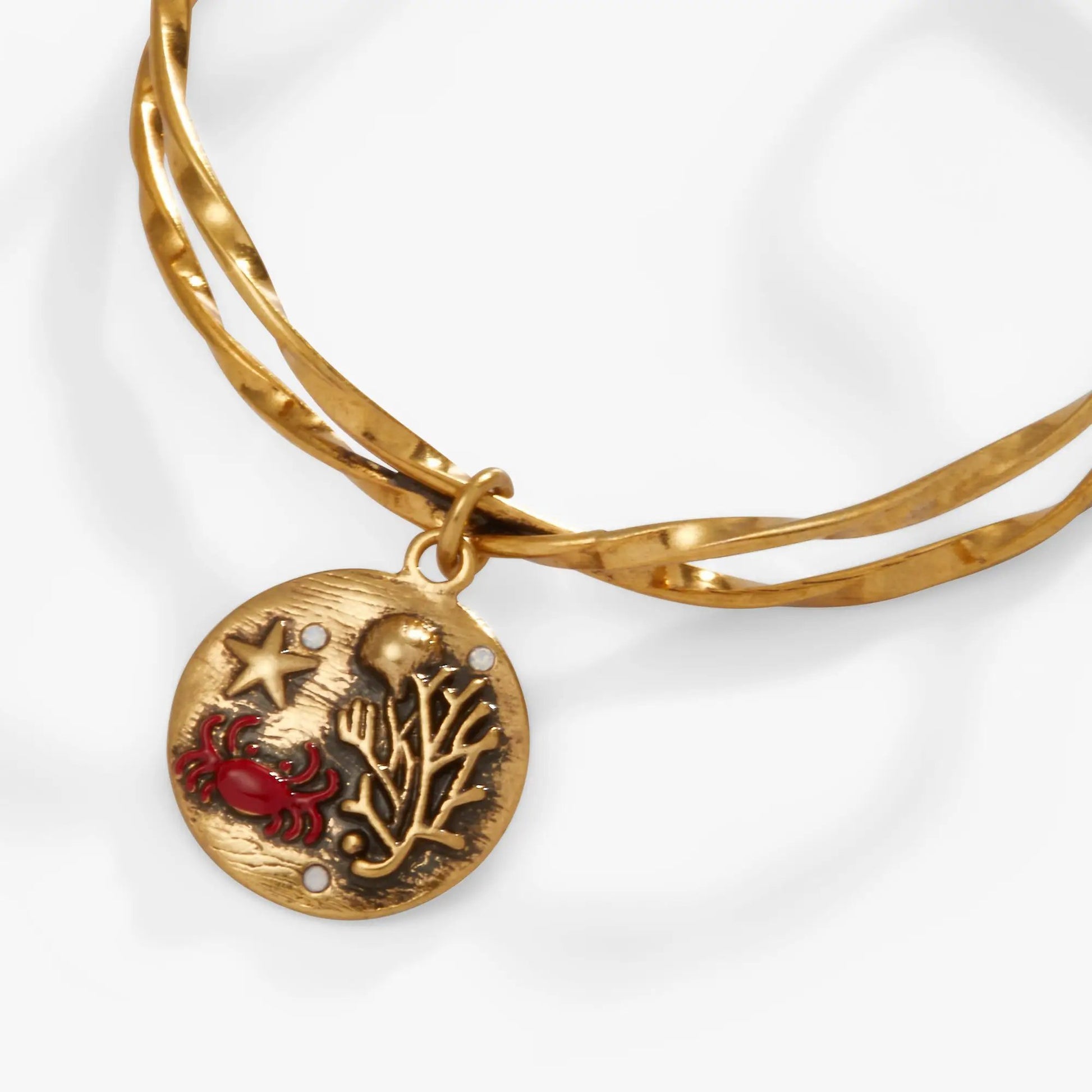 Sea Scene Twisted Cuff bracelet by ALEX AND ANI, gold-tone metal with round ocean motif pendant on Tampa Home & Garden Store